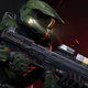 Master Chief holds up his assault rifle as he heads into battle.